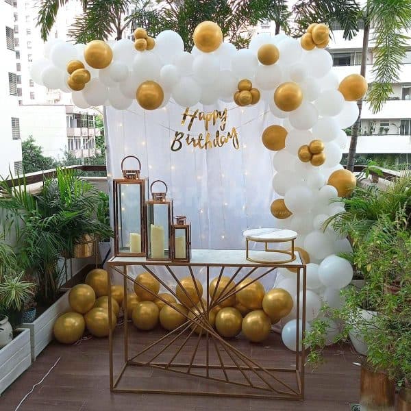 Romantic rooftop terrace balloon decoration setup in Bangalore