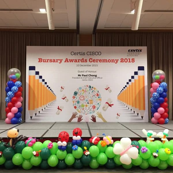 Stage balloon pillars decoration setup for birthday celebration in Bangalore