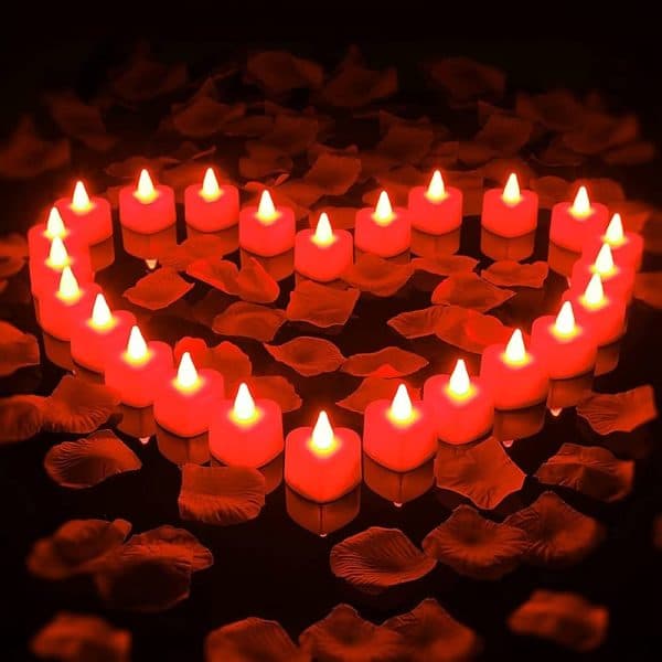 Simple candle light dinner setup at home with candles, rose petals, and elegant table decor for a romantic evening 3