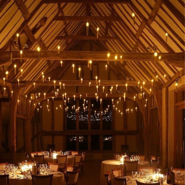 Simple candle light dinner setup at home with candles, rose petals, and elegant table decor for a romantic evening 4